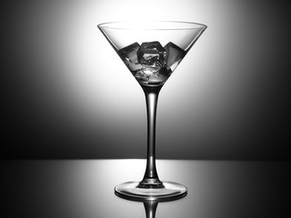 empty martini glass on black background