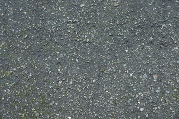 gray stone background of dirty asphalt on the road