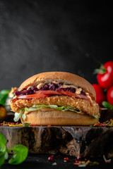Tasty grilled burger with chicken, turkey, or breaded fish fillets.  Delicious grilled hamburger on...