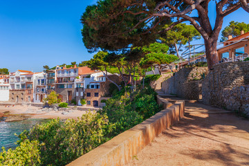 Sea landscape with Calella de Palafrugell, Catalonia, Spain near of Barcelona. Scenic fisherman village with nice sand beach and clear blue water in nice bay. Famous tourist destination in Costa Brava