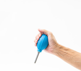 Man hand holding blue camera cleaning blower