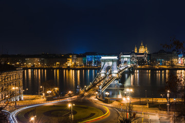 Fototapeta premium Night view of Budapest. Panorama cityscape of famous tourist destination with Danube and bridges. Travel illuminated landscape in Hungary, Europe.