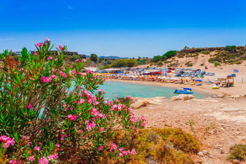 Sea skyview landscape photo of Agia Agathi beach near Feraklos castle on Rhodes island, Dodecanese, Greece. Panorama with sand beach and clear blue water. Famous tourist destination in South Europe
