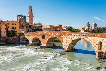 Panoramic cityscape aerial view on Verona historical center, bridge and Adige river. Famous travel destination in Italy. Old town where lived Romeo and Juliet from Shakespeare story