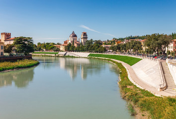 Obraz premium Panoramic cityscape aerial view on Verona historical center, bridge and Adige river. Famous travel destination in Italy. Old town where lived Romeo and Juliet from Shakespeare story