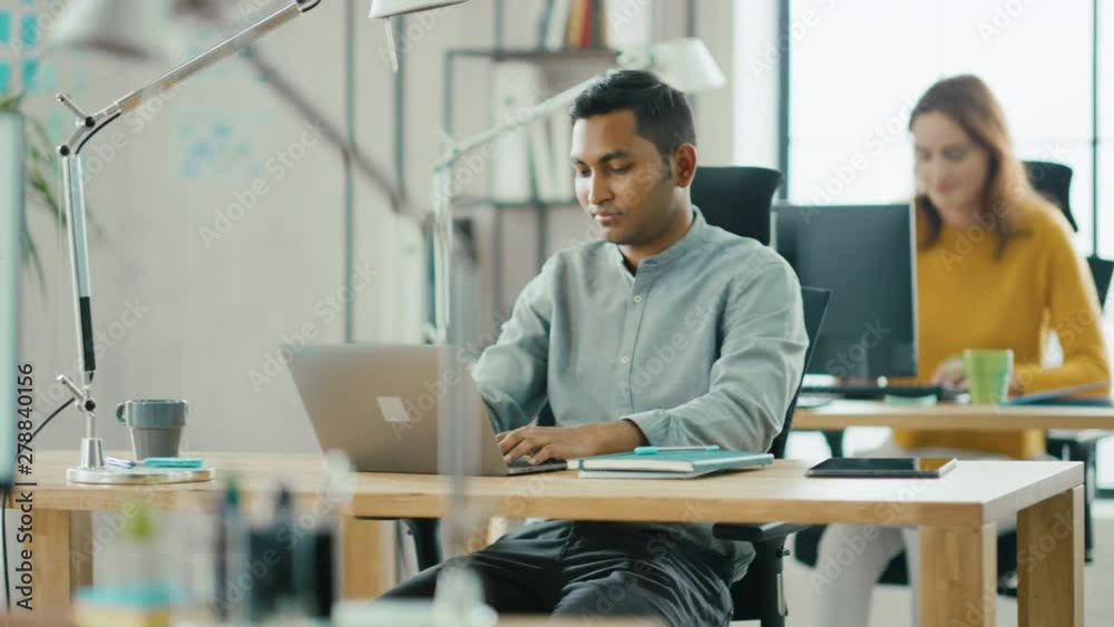 Poster Row of Diverse Team of Brilliant Young Professionals Working on Desktop Computers. Modern Stylish Office with Start-up Entrepreneurs Creating New Software