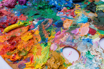 bright oil paint palette close up