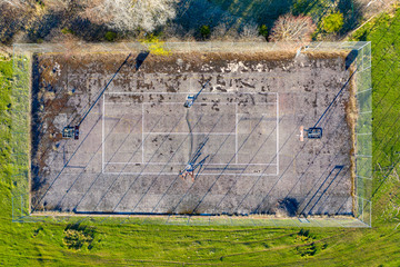 Abandoned tennis court in the countryside