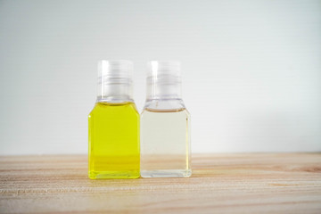 shower gel and syampoo on wooden background