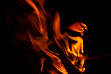 Abstract graphic wind blowing red flames on black background photo shot with natural light environment taken with tripod