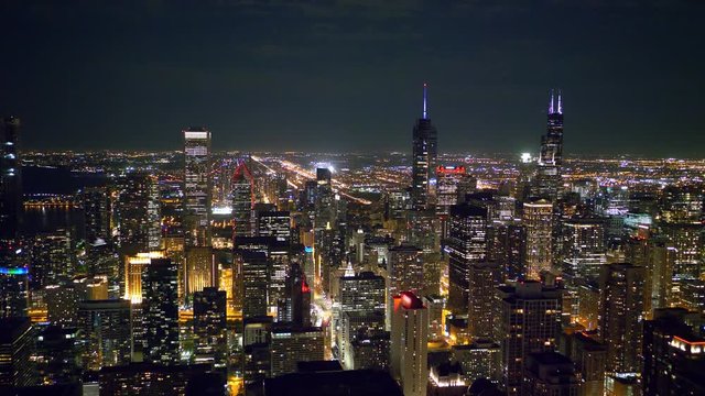 The skyscrapers of Chicago aerial view by night - aerial photography