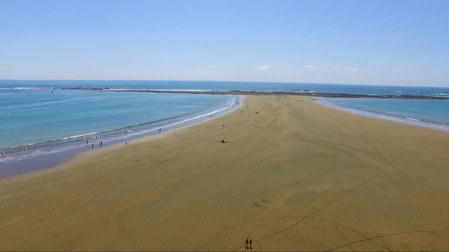 Panning aerial shot of Whale's Tail at Uvita's Marino Ballena National Park in Costa Rica