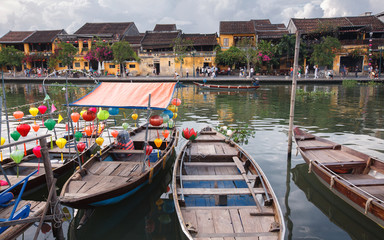 Fototapeta na wymiar Boats for Hire at Ancient Town of Hoi An, Vietnam