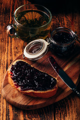 Toast with berry jam and green tea