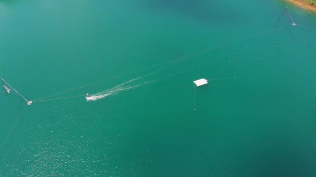 On holiday aerial drone shot of wake boarding