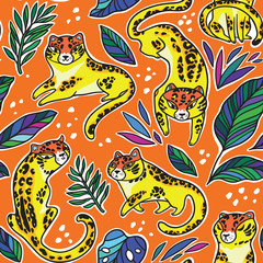 Obraz premium Seamless pattern with cute leopards on the orange background. Vector illustration