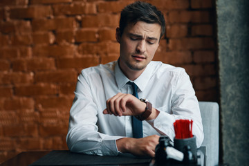 portrait of young man with cup of coffee