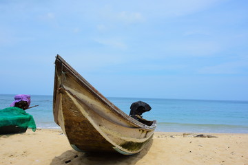 Fototapeta na wymiar Small fishing boats by the beach