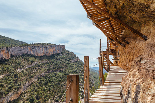 Footpath in the mountain making with wood in Montfalco, Spain