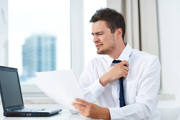 Fototapeta premium businessman working on his laptop in office