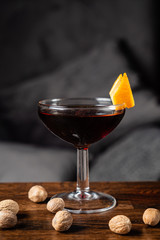 cocktail with nutmeg on the wooden table