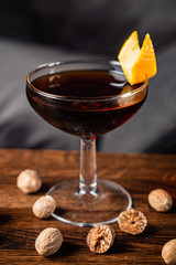 cocktail with nutmeg on the wooden table