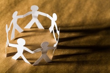 Paper People in a Circle Holding Hands