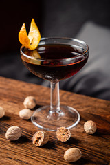 cocktail with nutmeg on the wooden table