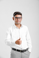 Young Indian man showing thumbs up