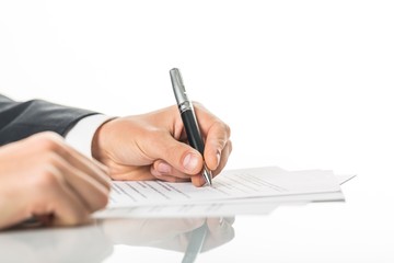 Closeup of a Businessman Signing a Contract