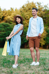 young couple walking in the park