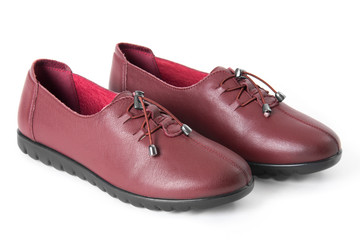 Pair of women leather shoes isolated on white background