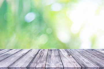 Abstract spring or summer with bokeh background and wooden tabletop