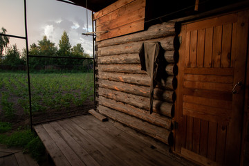 Old Russian bath at sunset