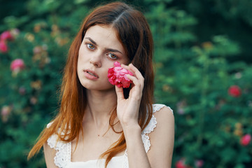 portrait of young woman with strawberry