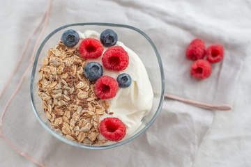 Granola with yogurt and berries for healthy breakfast
