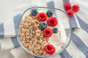 Granola with yogurt and berries for healthy breakfast