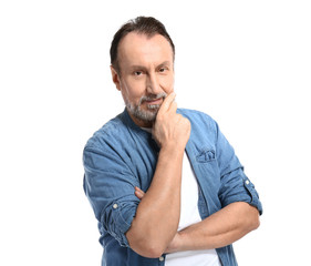 Portrait of handsome mature man on white background