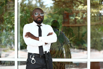 African-American security guard outdoors