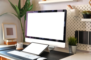 Loft workspace minimal desktop with  mockup desktop computer and tablet.