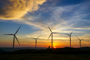 Wind turbine farm from clean energy. Wind power for electricity. © Golden House Images