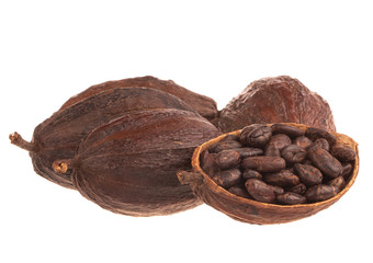 heap of cacao pods with cacao beans isolated on white