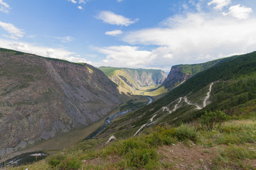 Valley of the river, top view. Altay mountains. Summer sunny day. Mountain car pass
