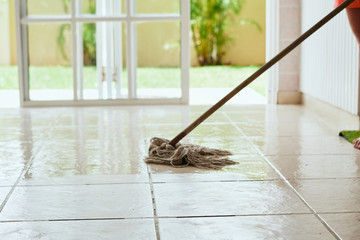cleaning the floor with mop