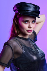 portrait of young woman in black hat