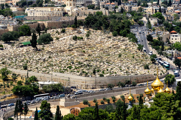Obraz premium The Jewish cemetery on the Mount of Olives in Jerusalem, ISRAEL . April 2013