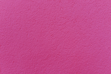 Pink cement or concrete wall texture for background. High resolution through process retouch.