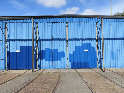 Blue Painted Metal Doors Ofan Old Shack Or Barn