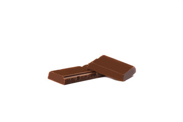 Portion of chocolate bar isolated on white background over white background.