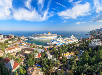 Naklejka na ściany i meble YALTA, CRIMEA, UKRAINE - JULY 7: Costa Mediterranea and Aida cruise liners in the port of Yalta.